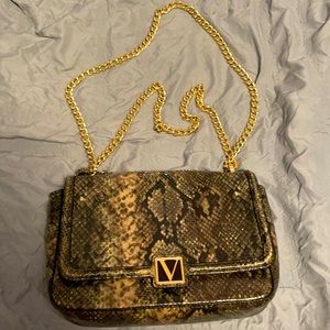 This is snake type Victoria secret purse !